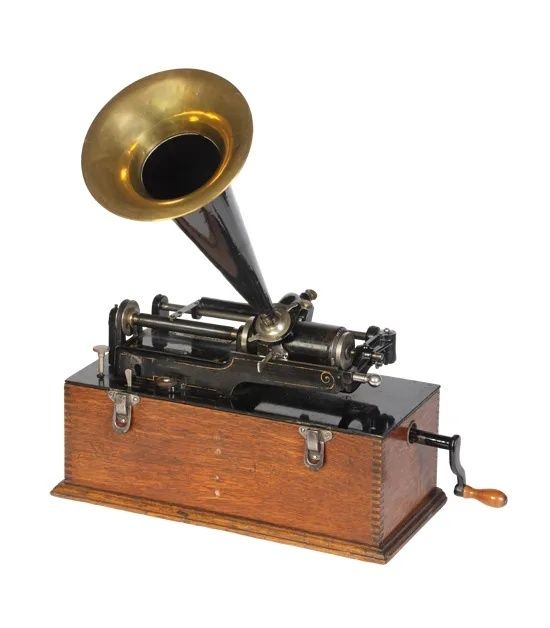 Antique cylinder phonograph with brass horn and wooden base
