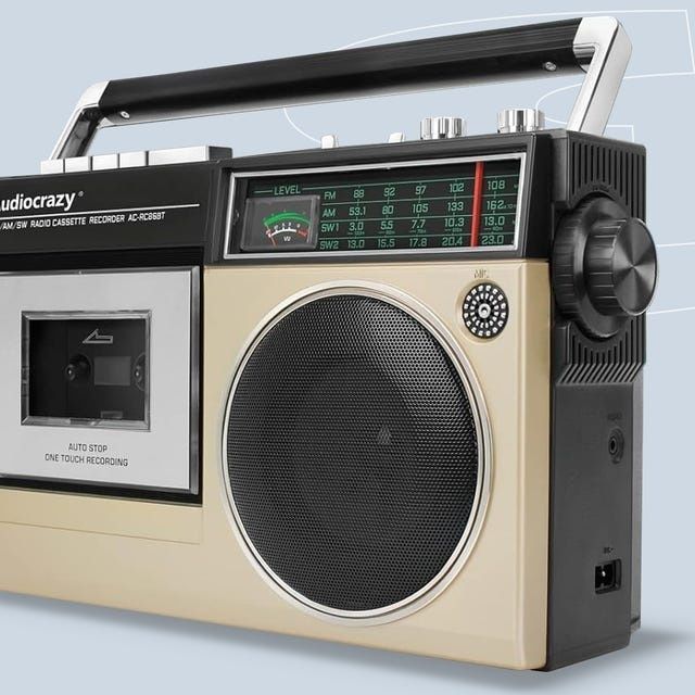Vintage portable cassette recorder with radio tuning dial and speaker
